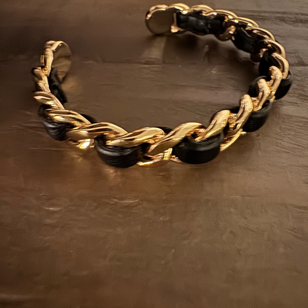 Henri Bendel gold & black leather cuff.